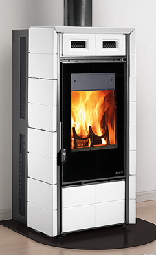 NORDICA-EXTRAFLAME FUTURA 10  Kw Revestimiento exterior de mayólica  Wood stove with the possibility of automatic loading of the briquettes  Cajón de cenizas extraíble Colores: blanca infinity o negro brillante.